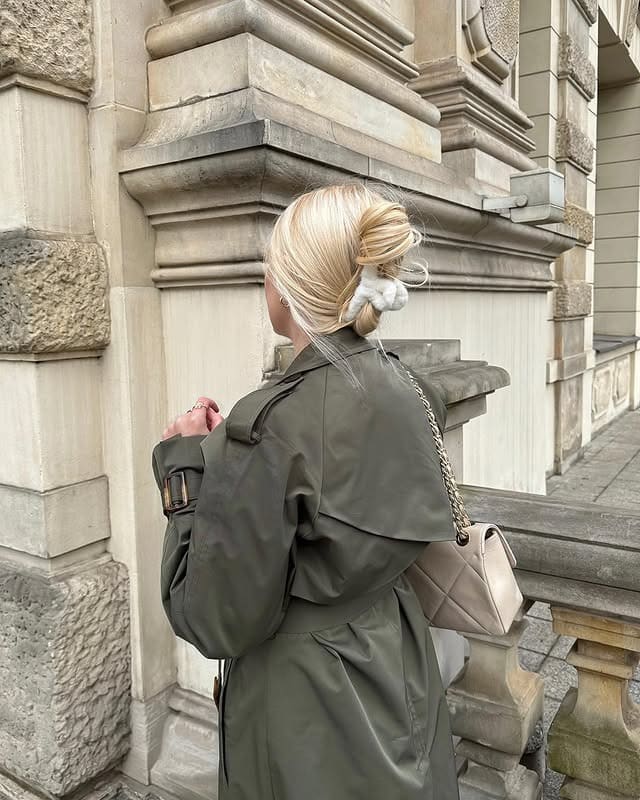 16. Icy Blonde Low Claw Clip Bun - Claw Clip Hairstyles
