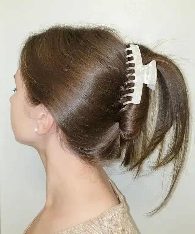 19. Medium Brown Claw Clip Ponytail Twist - Claw Clip Hairstyles