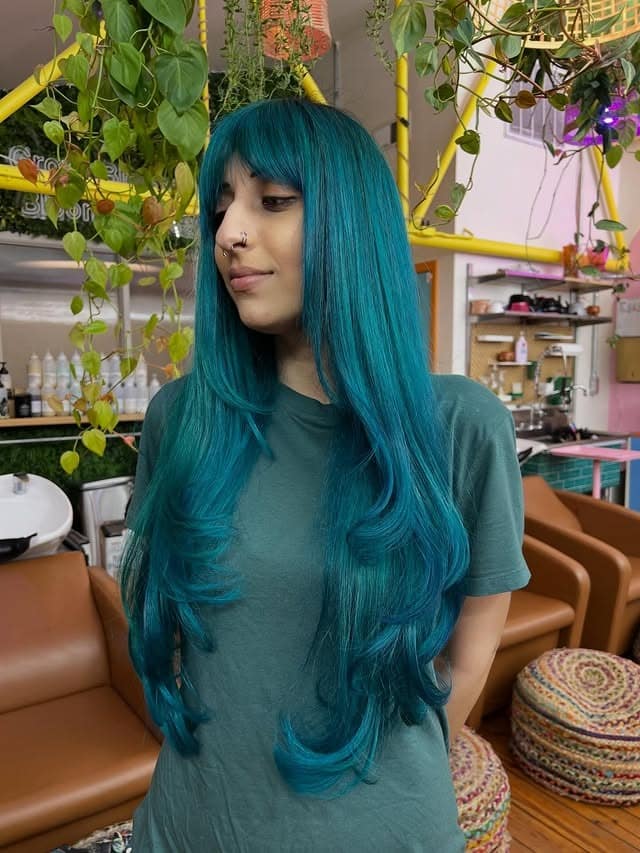 3. Long Layered Hair with Vibrant Teal Color - Teal Hair Color