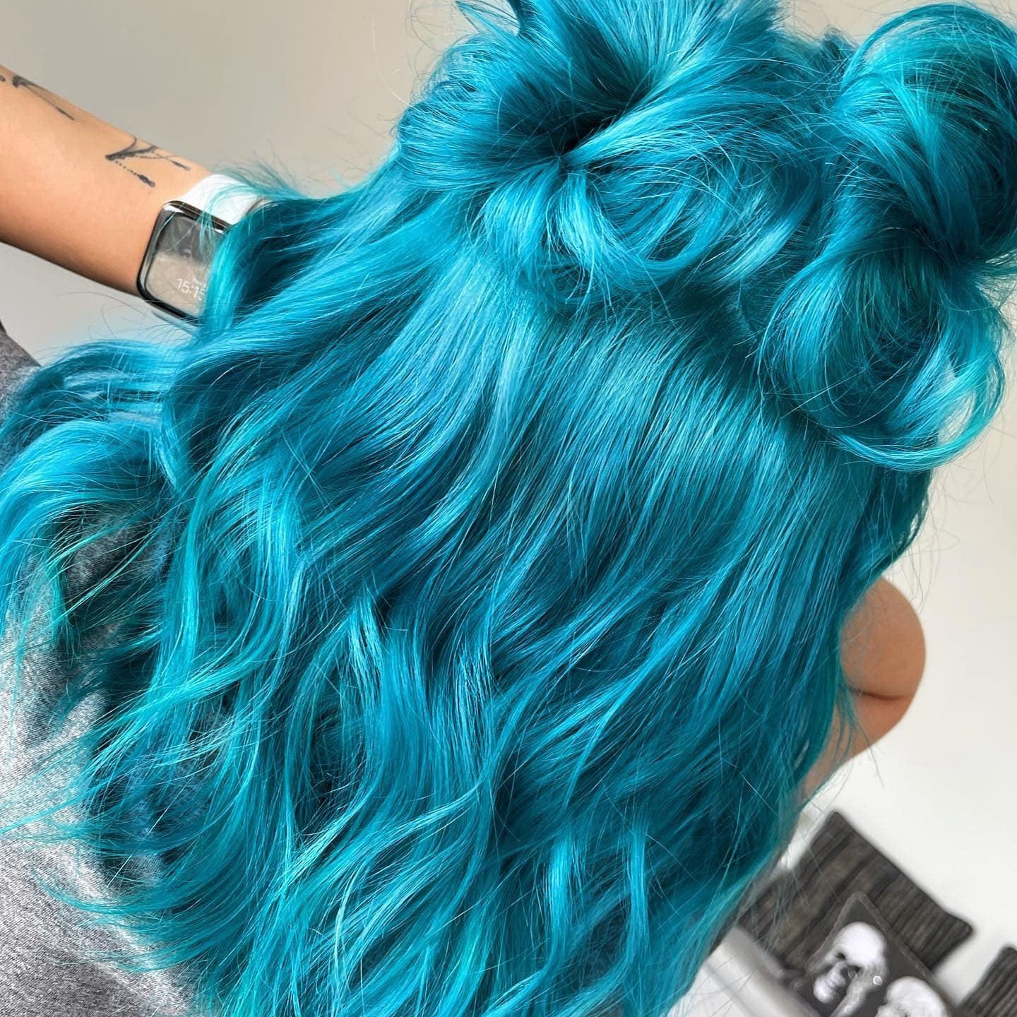 6. Electric Teal Half-Up Space Buns - Teal Hair Color