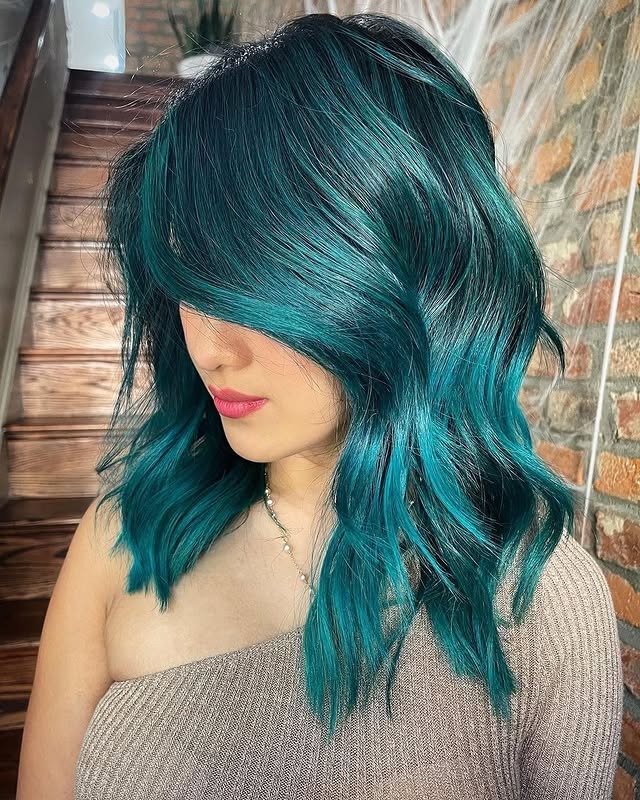 9. Teal Bob with Side-Swept Layers - Teal Hair Color