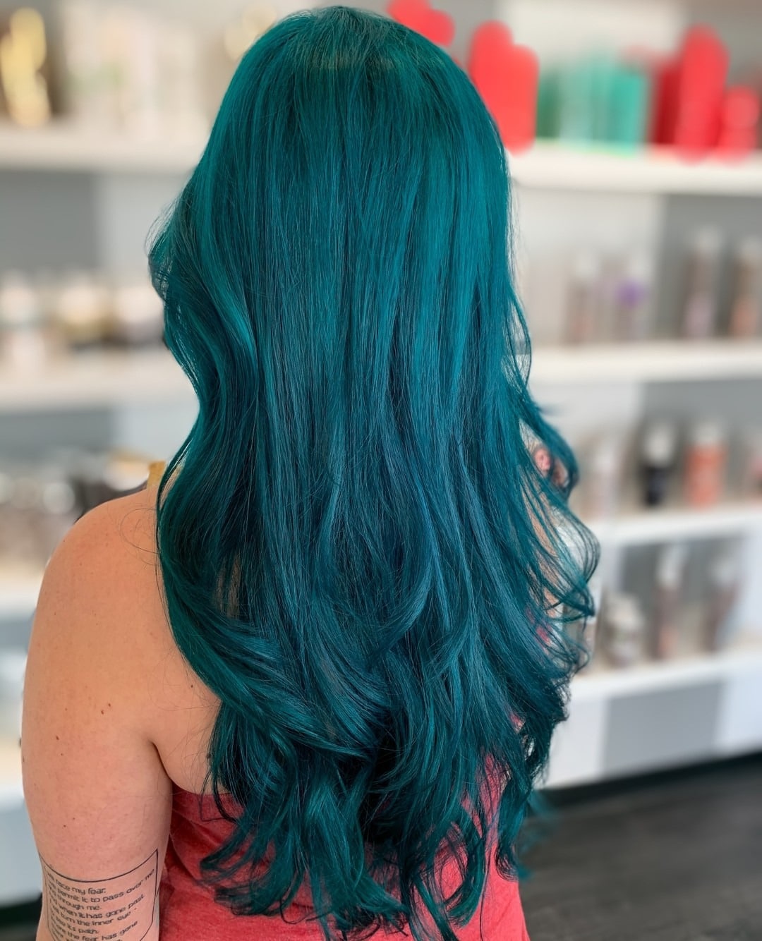 17. Rich Teal Long Layers with Soft Waves - Teal Hair Color
