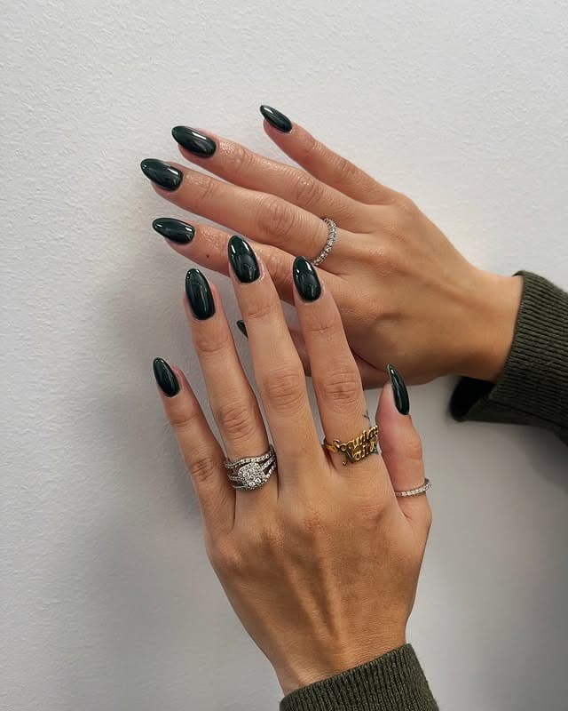 6. Dark Green Long Almond Nails - dark green nail ideas