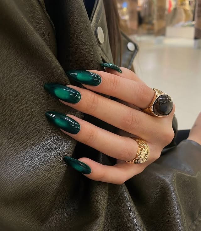 7. Dark Green Velvet Cat Eye Nails - dark green nail ideas