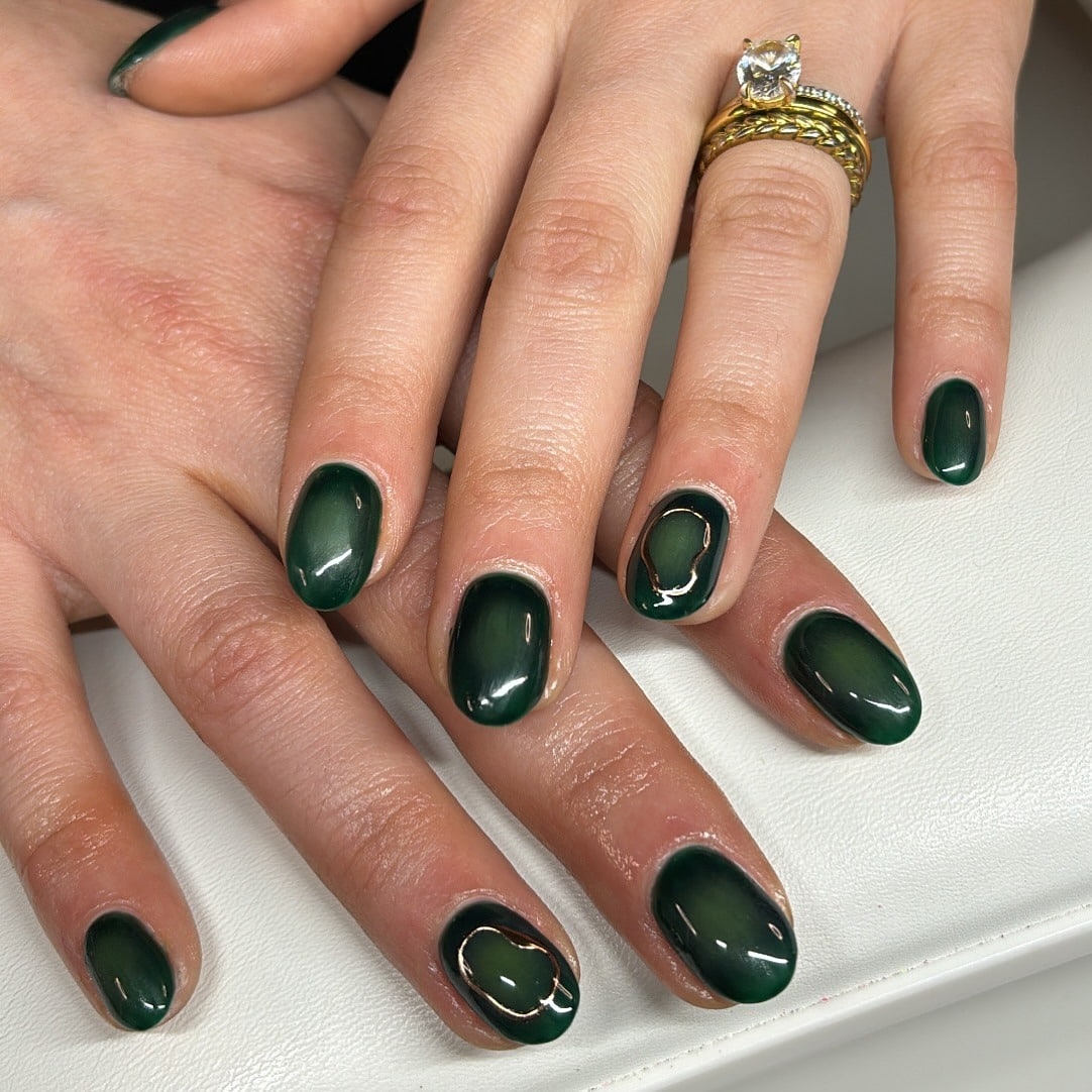 10. Dark Green Aura Accent Nails - dark green nail ideas