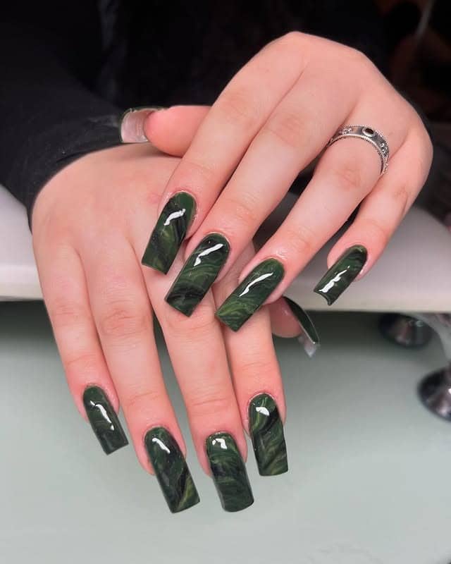 11. Dark Green Marble Coffin Nails - dark green nail ideas