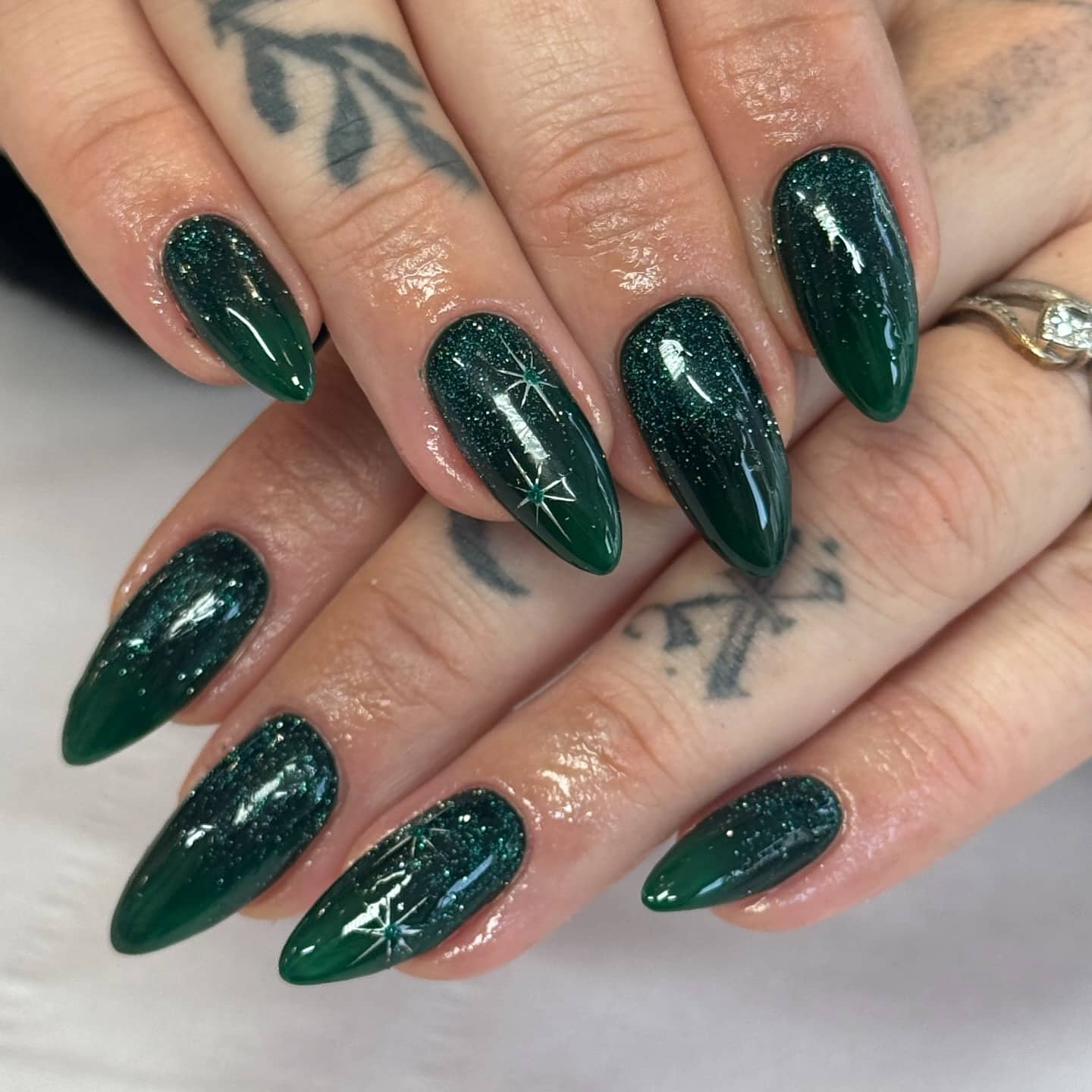 13. Glitter Dark Green Almond Nails - dark green nail ideas