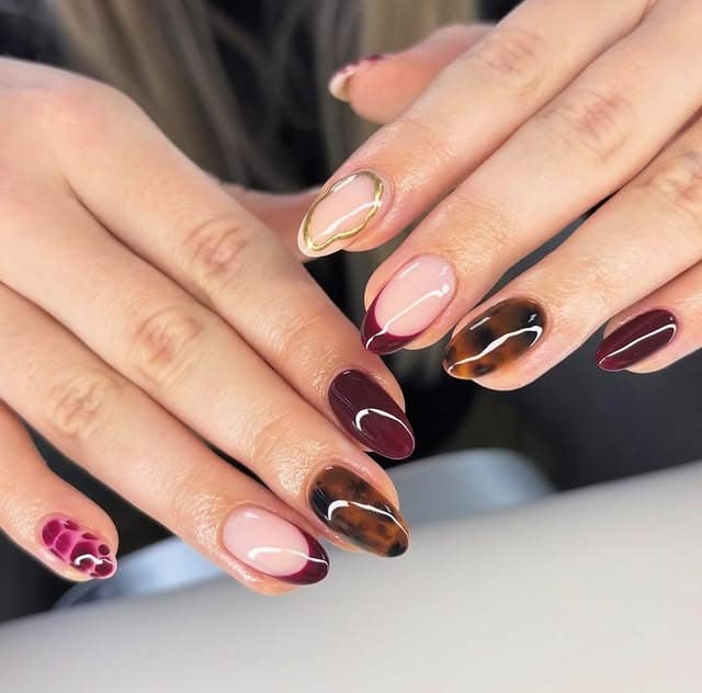 2. Burgundy Almond Nails with Tortoiseshell Art - fancy nail ideas