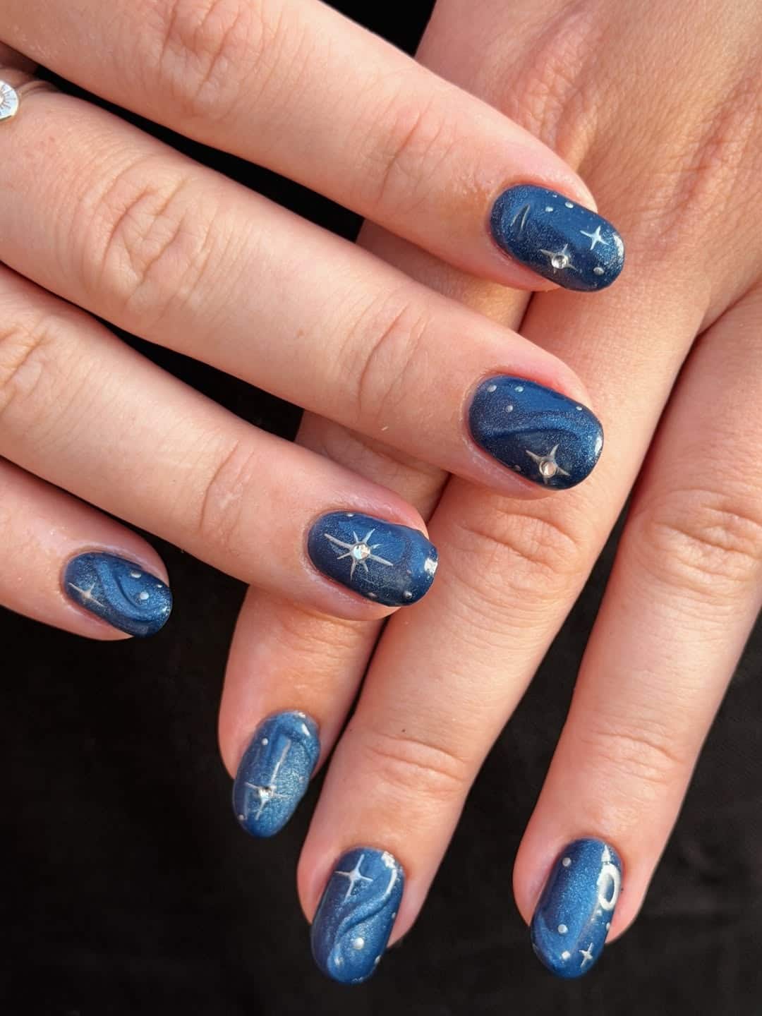 11. Midnight Blue Galaxy Short Nails with Celestial Art - fancy nail ideas