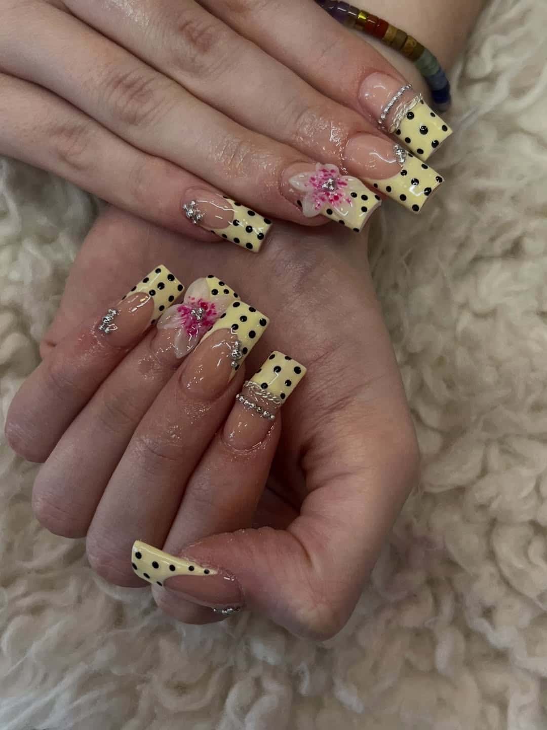 12. Butter Yellow Polka Dot Square Nails with Pink Floral Accent - fancy nail ideas