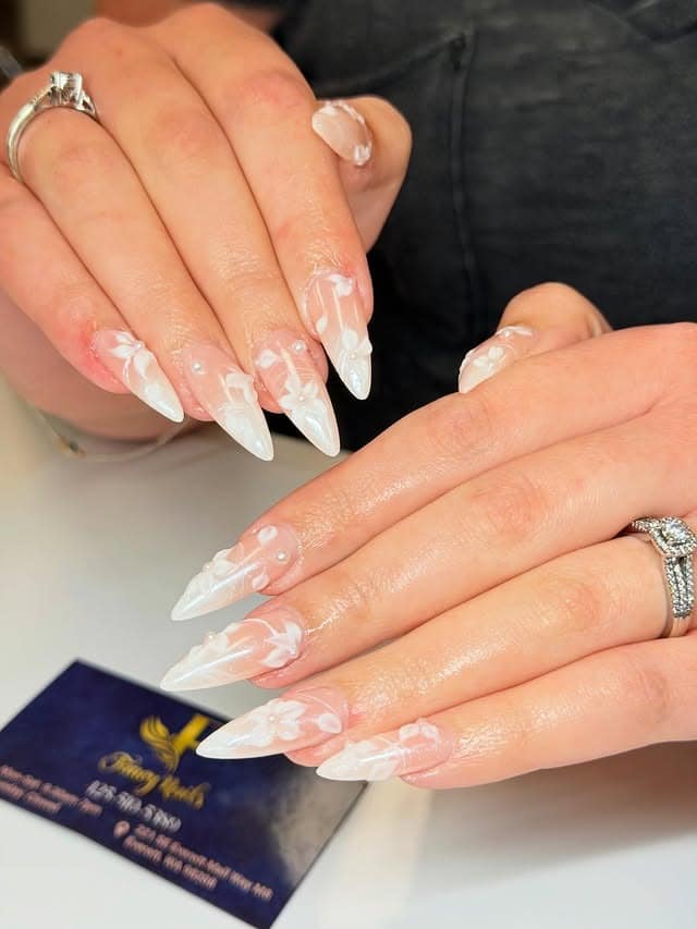 14. Milky White Stiletto Nails with 3D Floral Art - fancy nail ideas