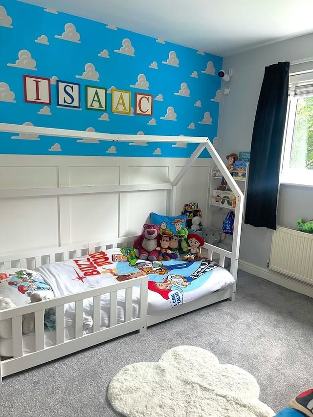6. Blue Toy Story Toddler Bedroom Ideas with Character Wall - toddler bedroom ideas