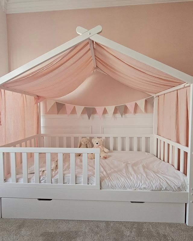 7. Soft Pink Toddler Bedroom Ideas with House Bed Canopy - toddler bedroom ideas
