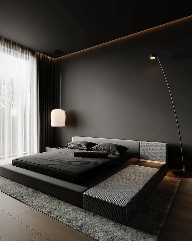 1. Black Minimalist Platform Bedroom with Charcoal Accents - black bedroom ideas