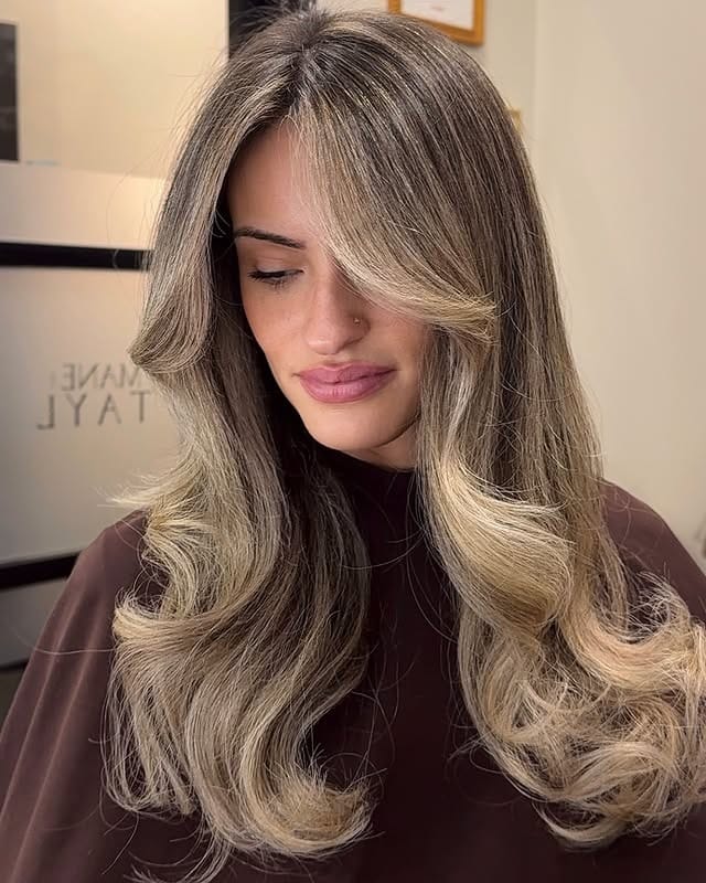 5. Ash Bronde Butterfly Layers - Winter Hair Color