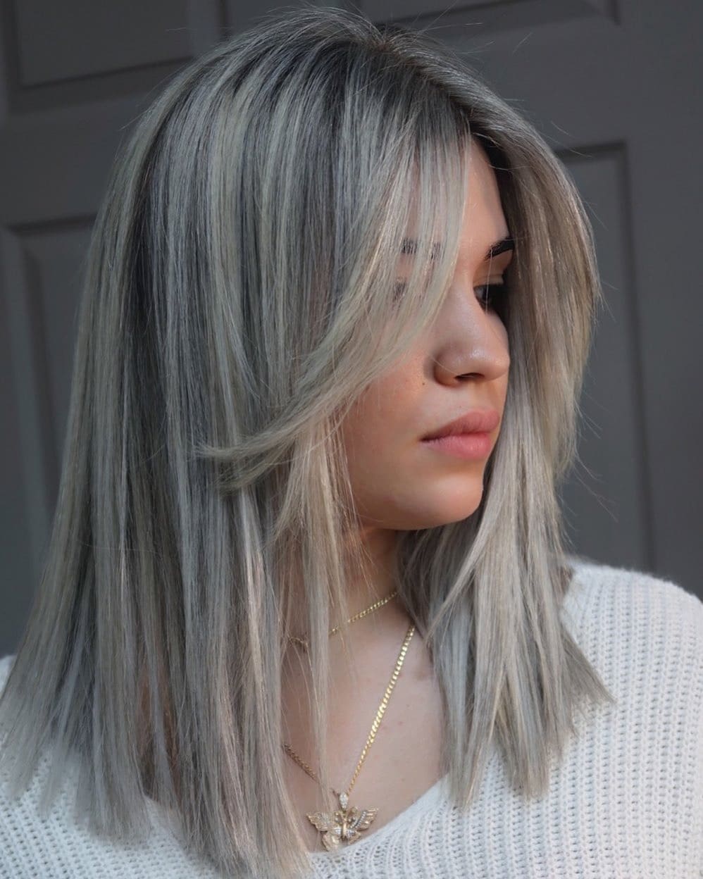13. Silver Ash Blonde Layered Lob - Winter Hair Color