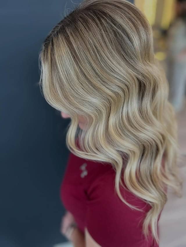 21. Icy Vanilla Blonde Hollywood Waves - Winter Hair Color