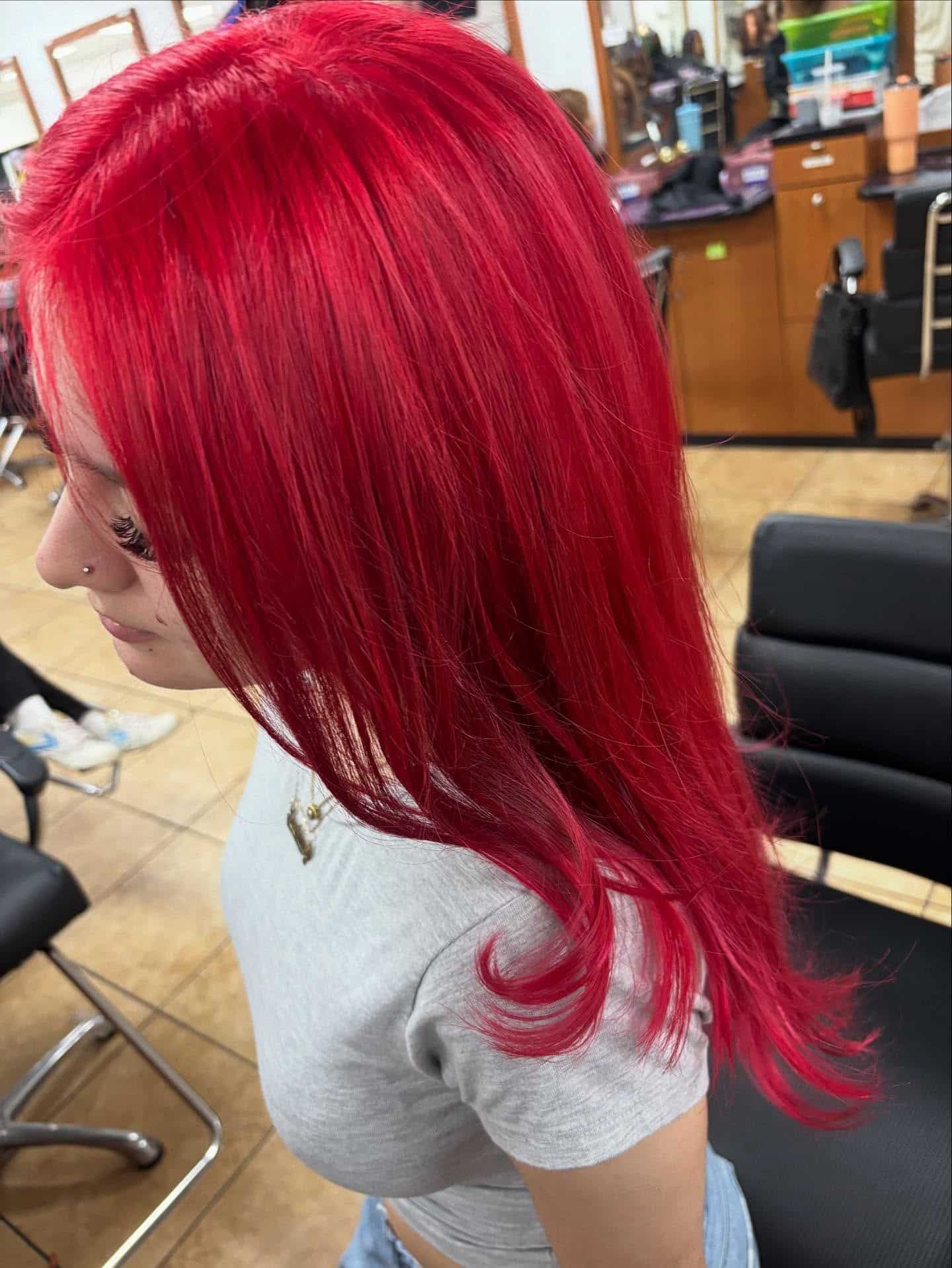 5. Vivid Crimson Straight Layers - Baddie Hairstyles