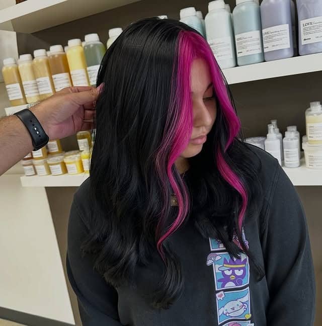 10. Black Hair with Neon Pink Money Piece - Baddie Hairstyles