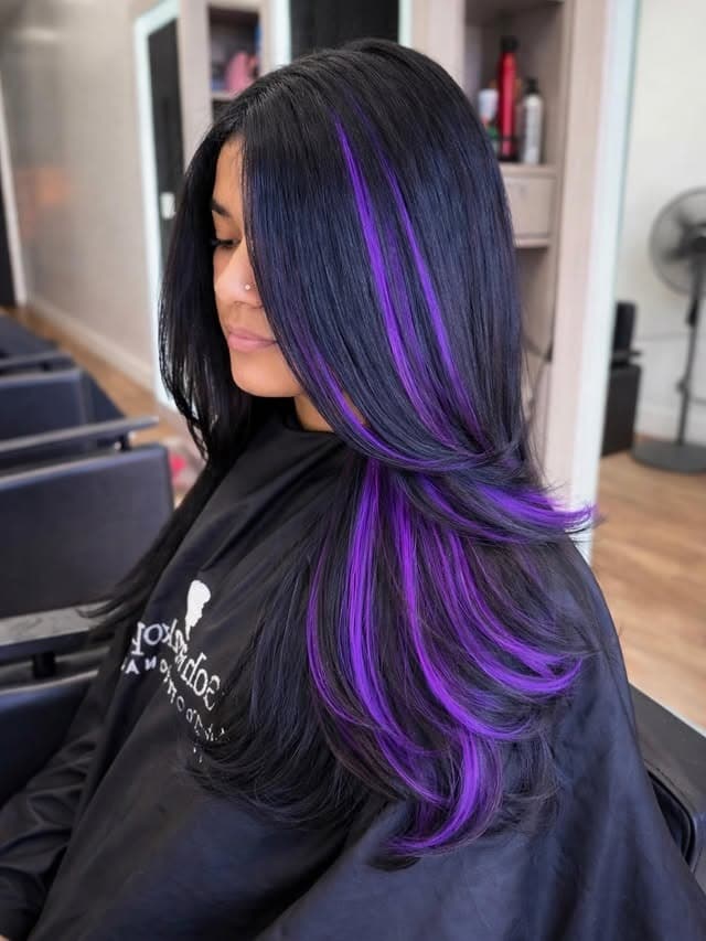 19. Jet Black Layers with Electric Purple Highlights - Baddie Hairstyles