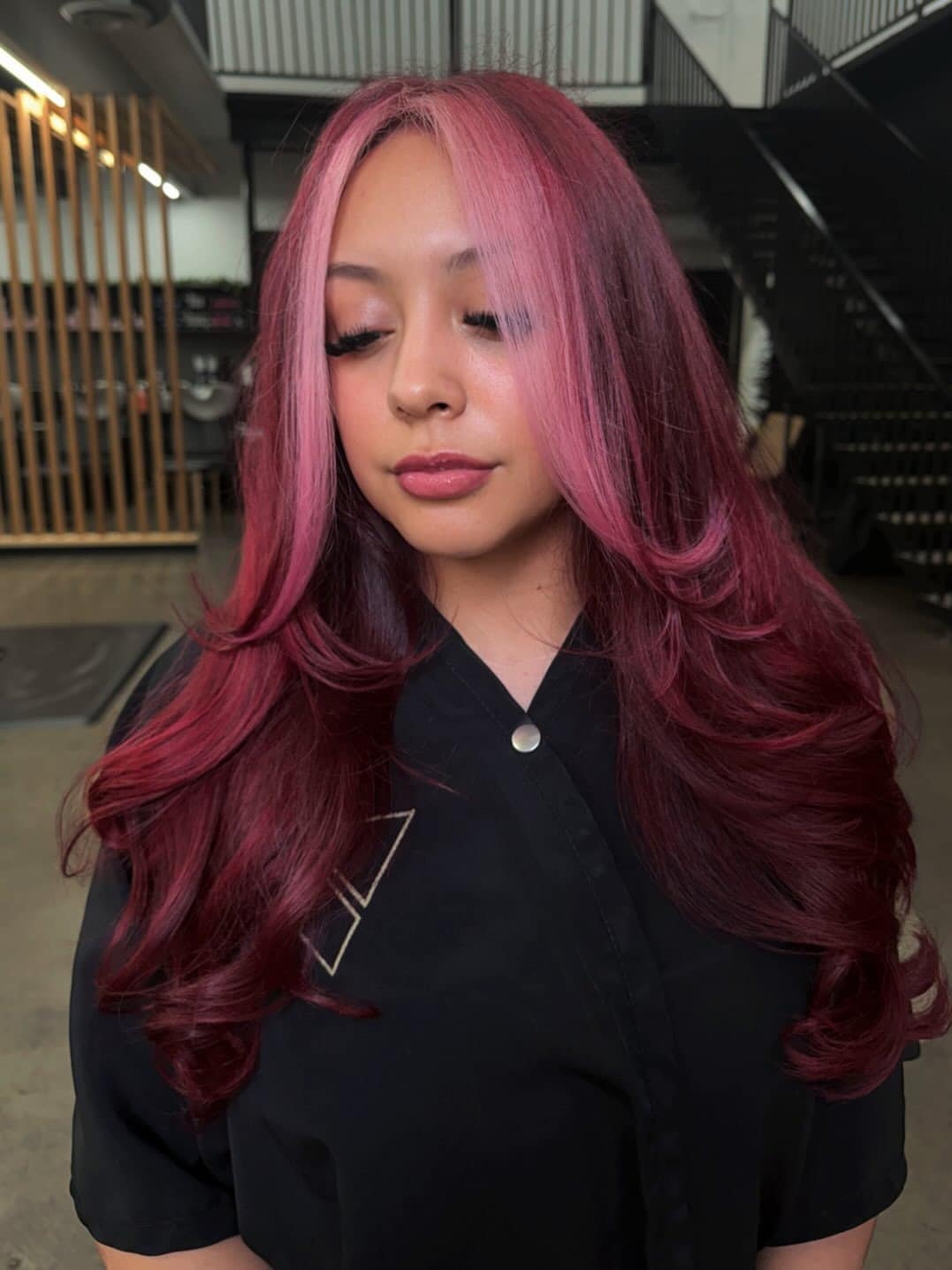 21. Burgundy Waves with Soft Pink Money Piece - Baddie Hairstyles