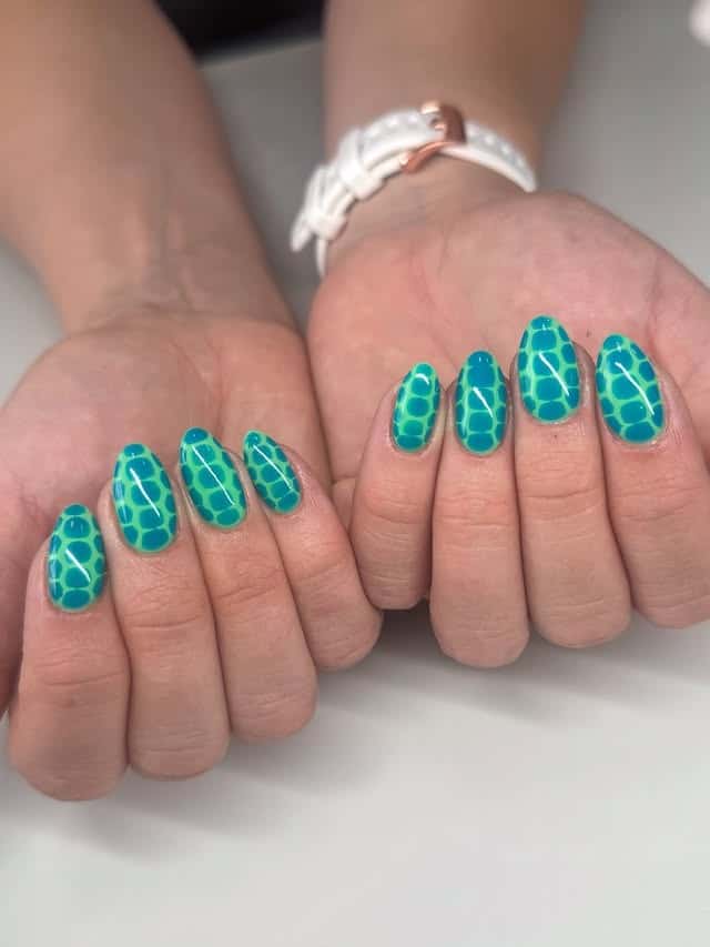 3. Turquoise Green Abstract Pattern Nails - march nail ideas