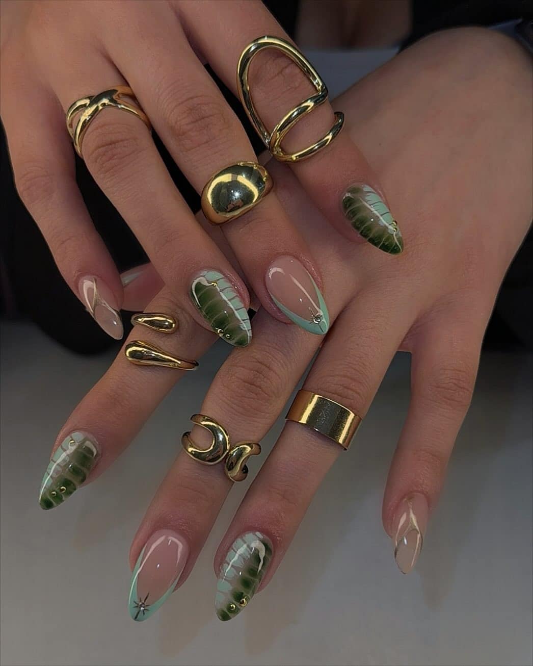 4. Botanical Green Leaf Almond Nails - march nail ideas