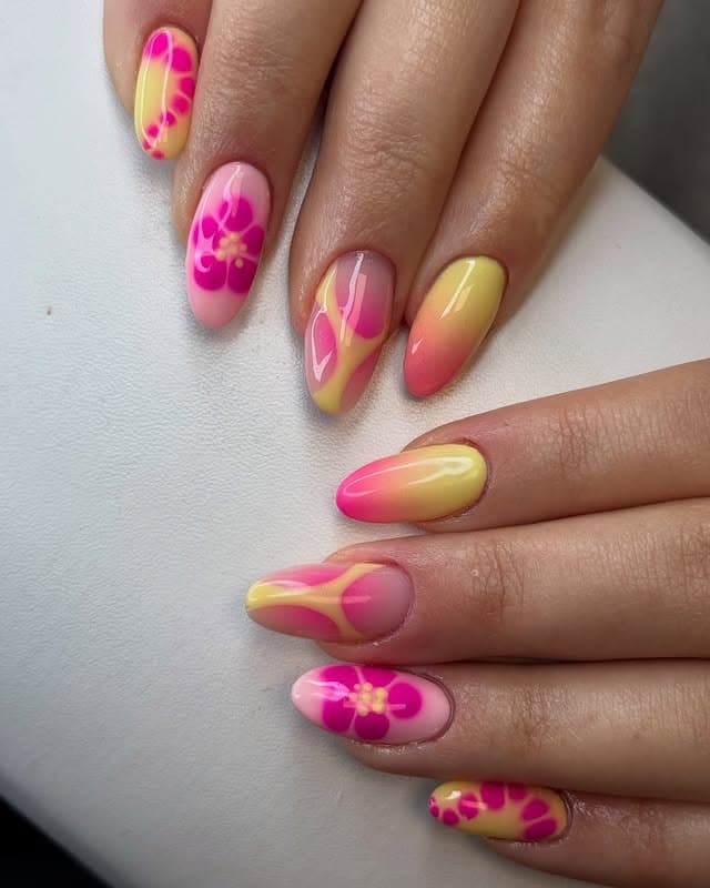8. Pink and Yellow Tropical Flower Nails - march nail ideas