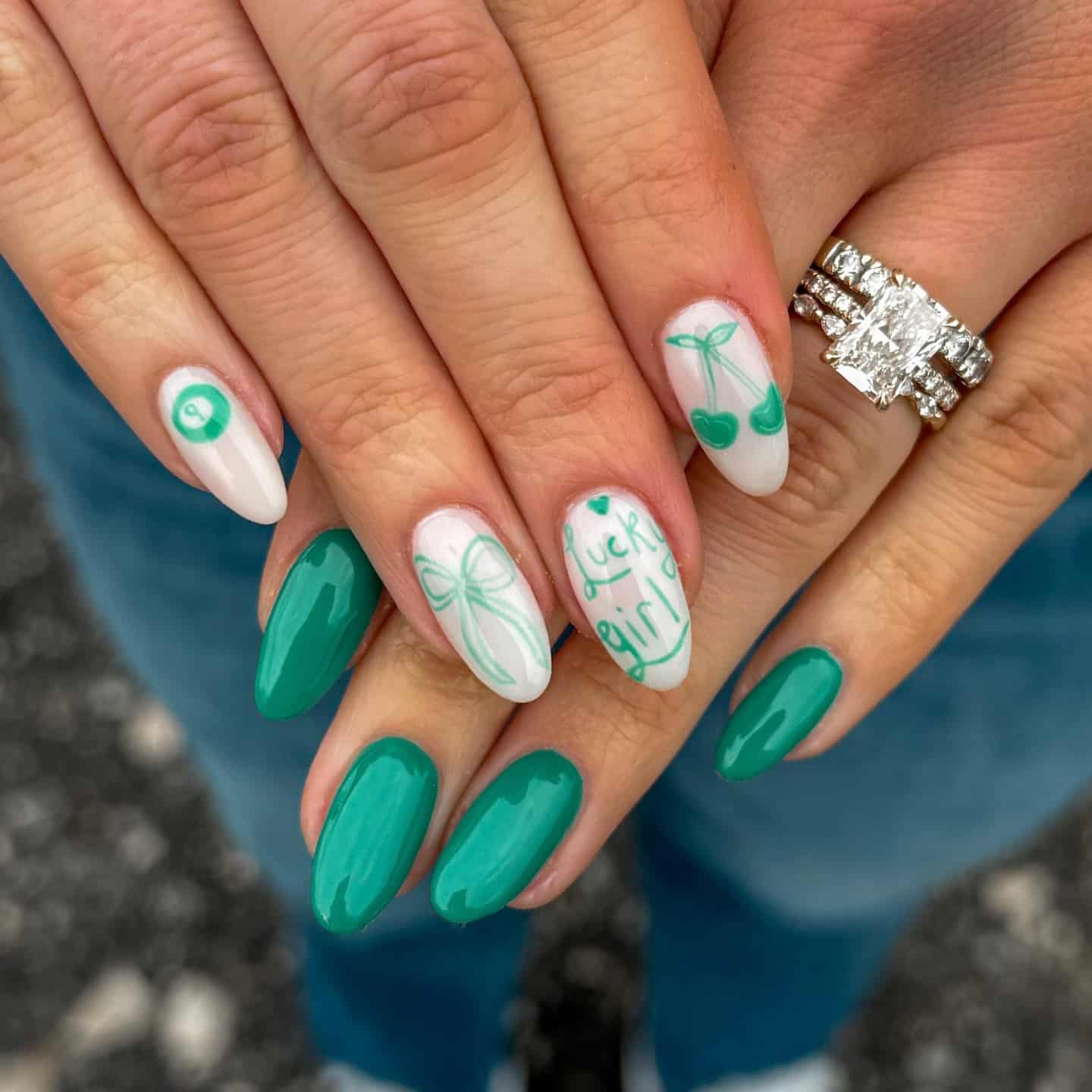 20. Emerald Green Cherry Almond Nails - march nail ideas