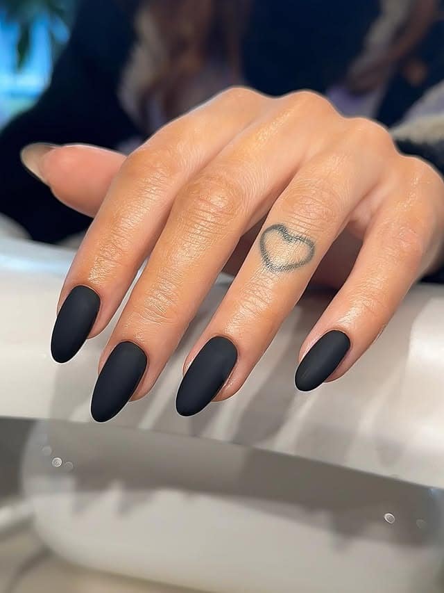 1. Matte Black Almond Nails - matte nail ideas