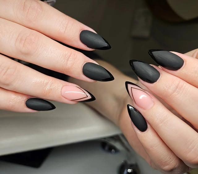 16. Matte Black Geometric French Stiletto Nails - matte nail ideas