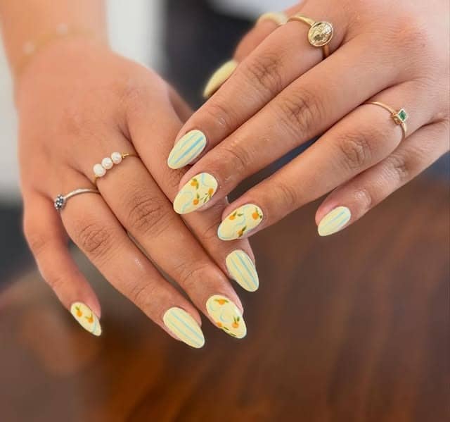 1. Pastel Lemon Floral Almond Nails - pastel nail ideas