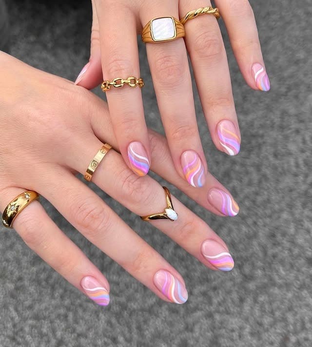 7. Pastel Abstract Wave Nails - pastel nail ideas