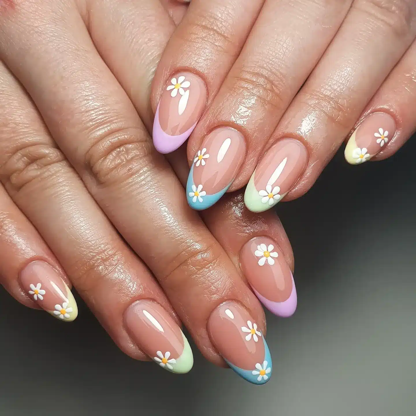 22. Pastel Daisy French Tip Almond Nails - pastel nail ideas