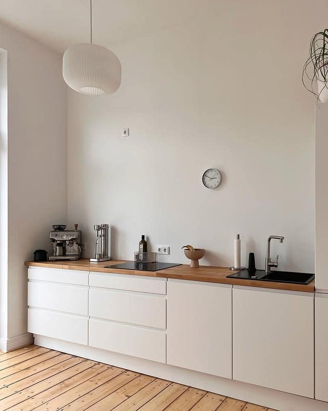 22. Minimalist Kitchen Ideas with White Cabinets and Wood Countertops - minimalist kitchen ideas