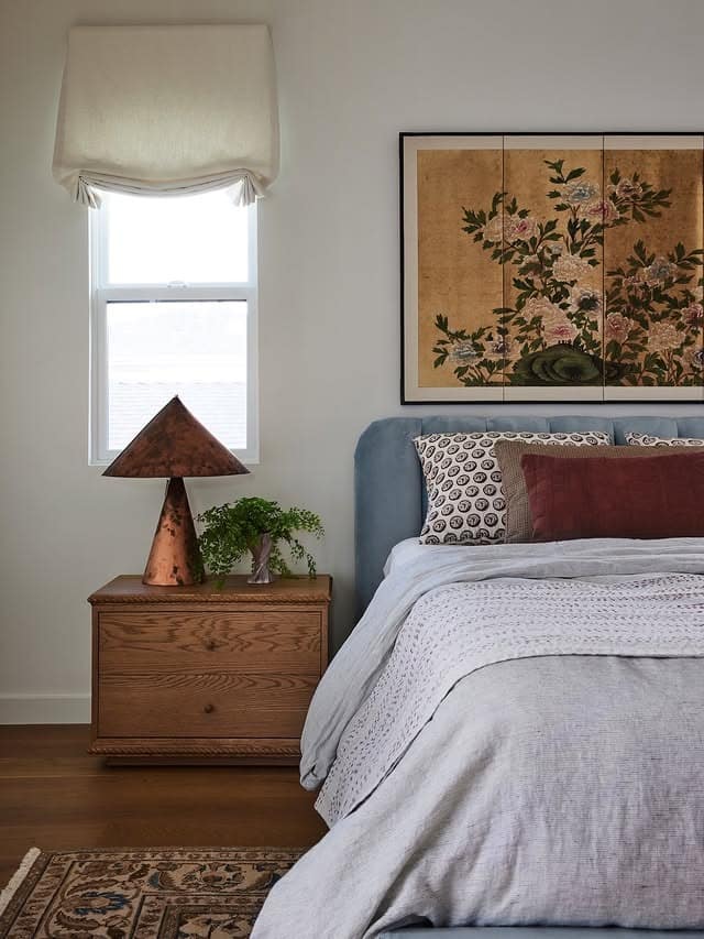 10. Traditional Bedroom Ideas with Soft Blue and Antique Wood Touches - traditional bedroom ideas