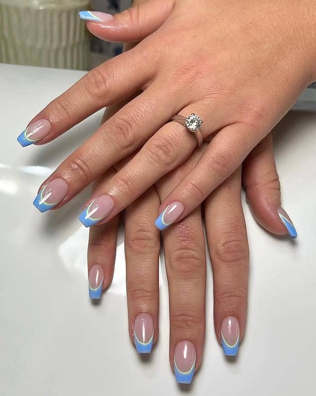 22. Sky Blue French Tip Short Coffin Nails - short coffin nail ideas