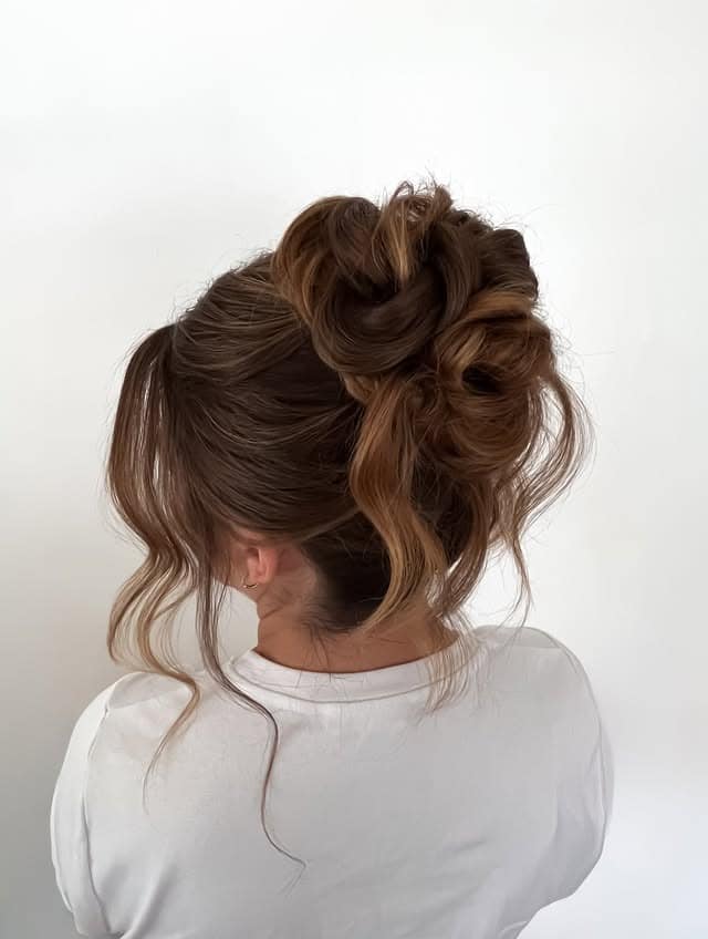 1. Soft Textured High Bun with Warm Chestnut Brown Hair - Bun Hairstyles
