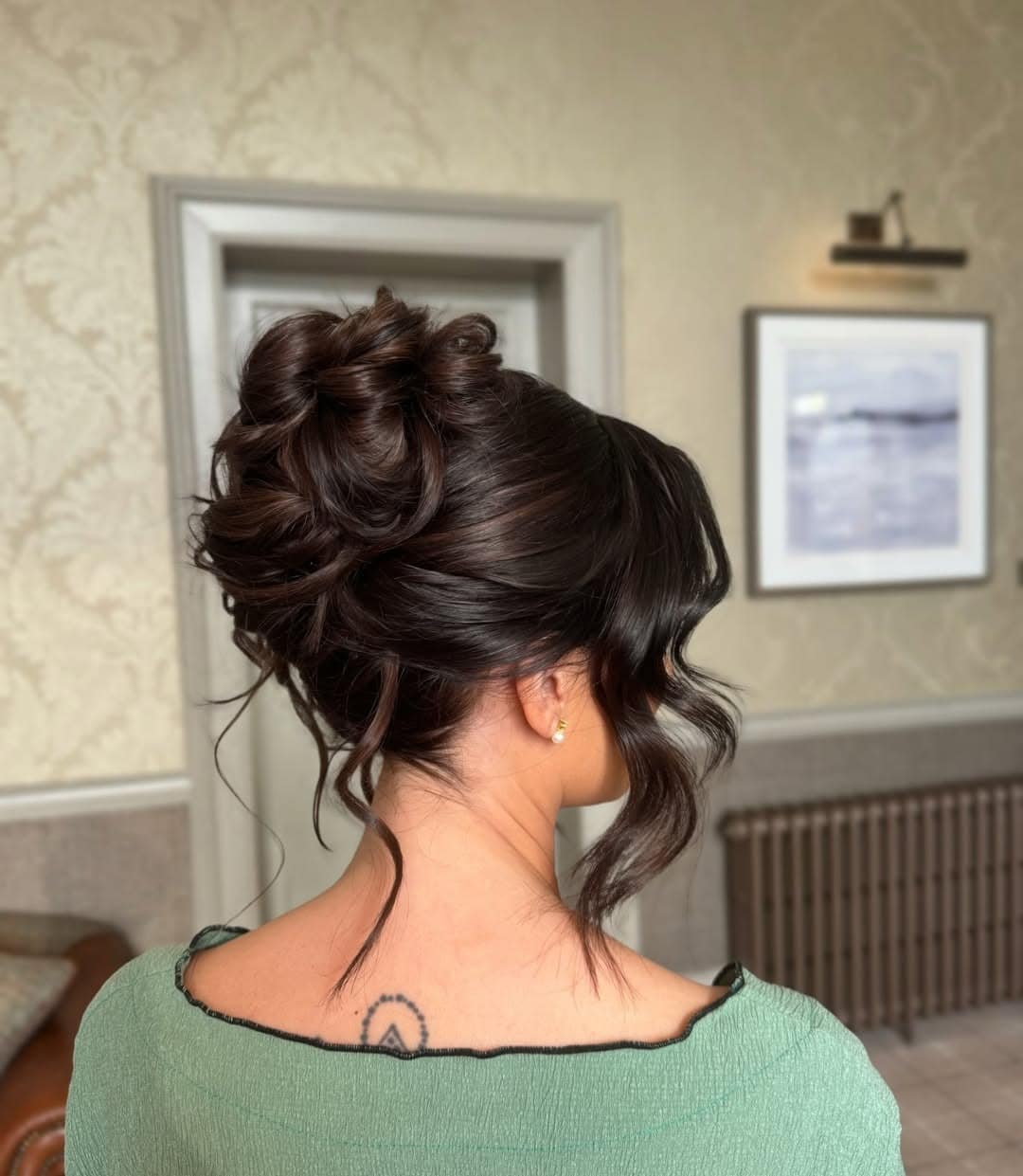 4. Romantic Messy Bun with Dark Chocolate Brown Hair - Bun Hairstyles