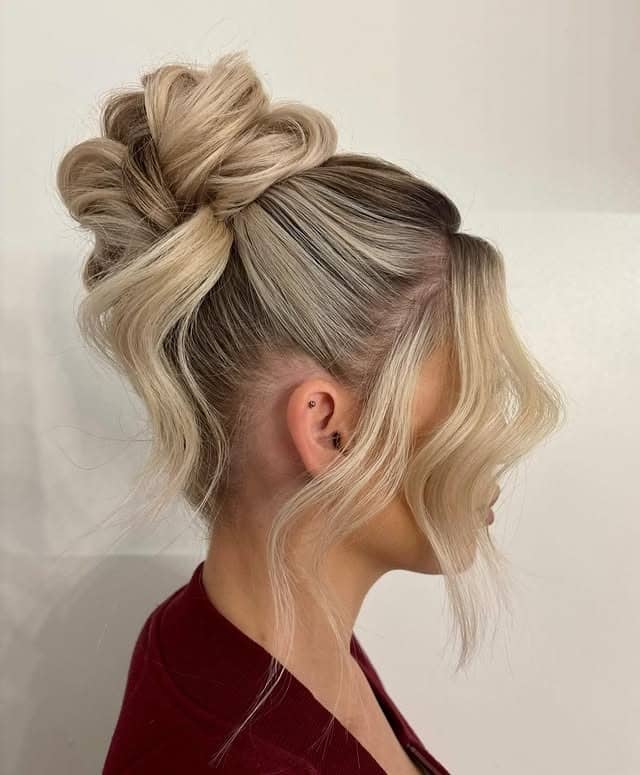 12. High Loop Bun with Bright Platinum Blonde Hair - Bun Hairstyles