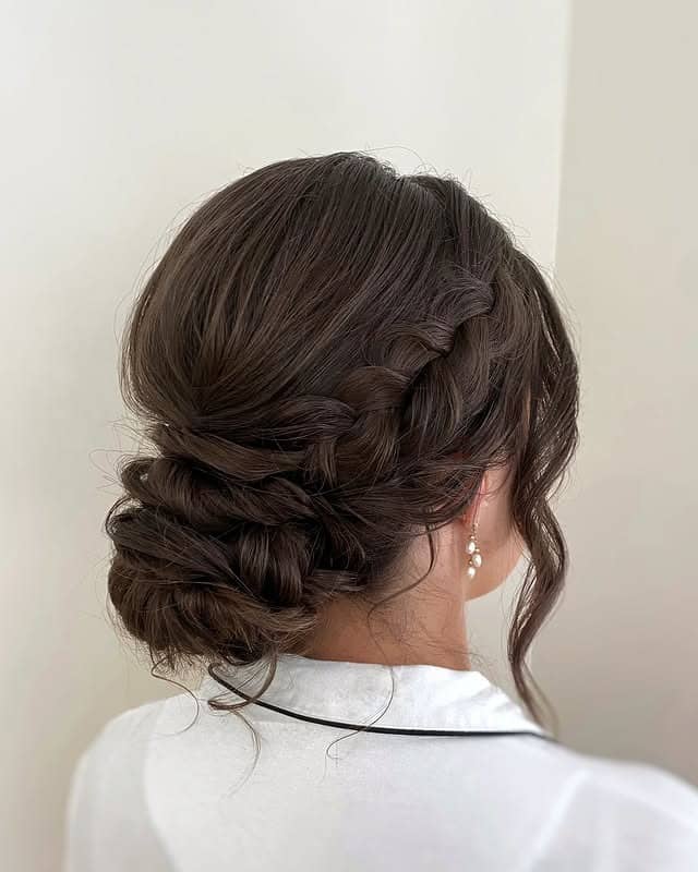 18. Soft Braided Low Bun with Chocolate Brown Hair - Bun Hairstyles