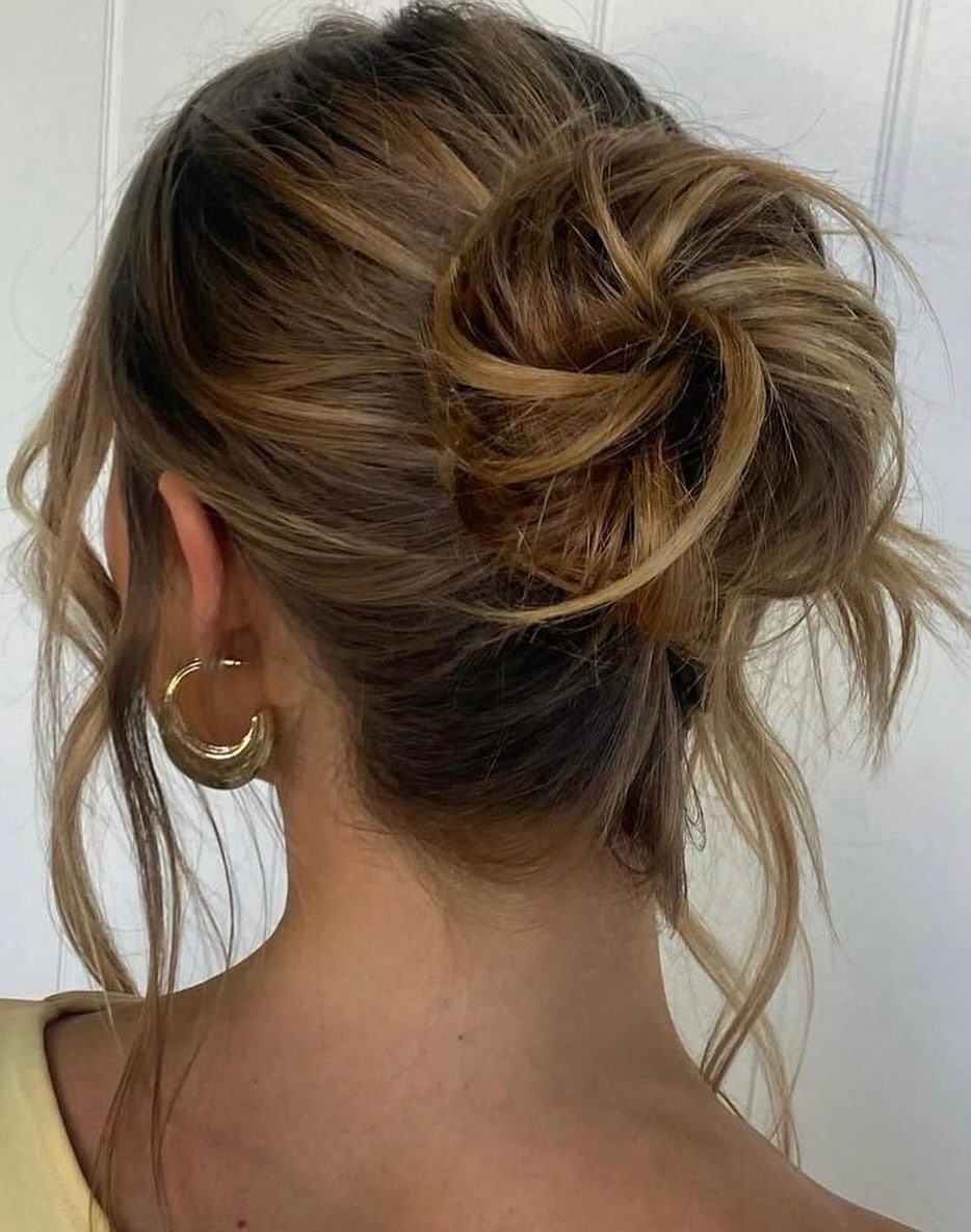 20. Messy High Bun with Golden Brown Balayage - Bun Hairstyles