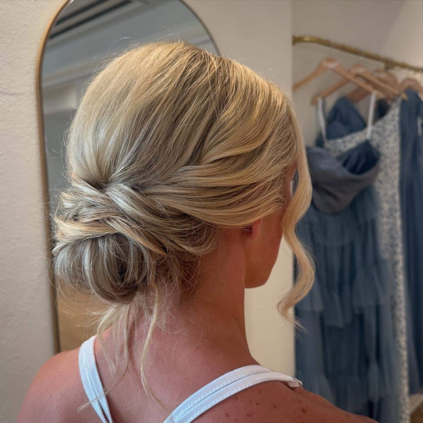 22. Twisted Low Bun with Champagne Blonde Hair - Bun Hairstyles