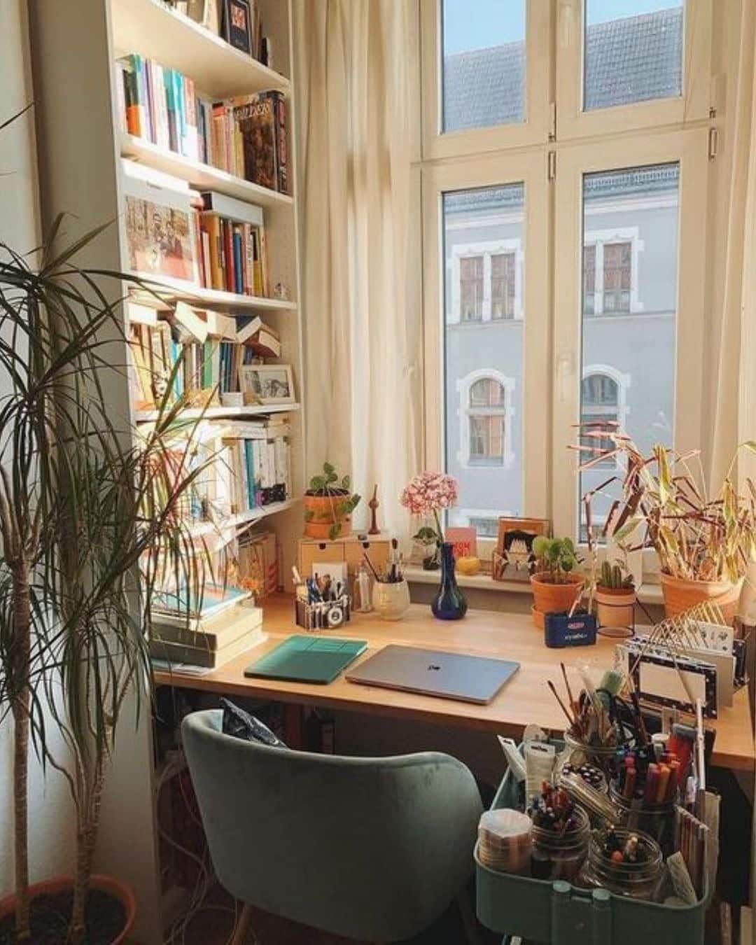 9. Botanical Small Home Office with Natural Wood and Green Decor - small home office ideas