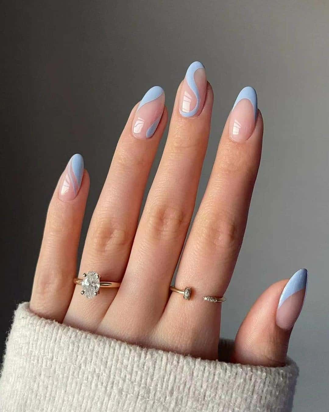 9. Baby Blue Swirl French Almond Nails - swirl nail ideas
