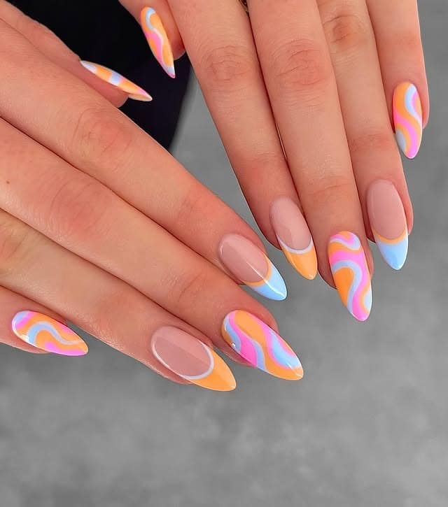 13. Pastel Orange and Blue Swirl Almond Nails - swirl nail ideas