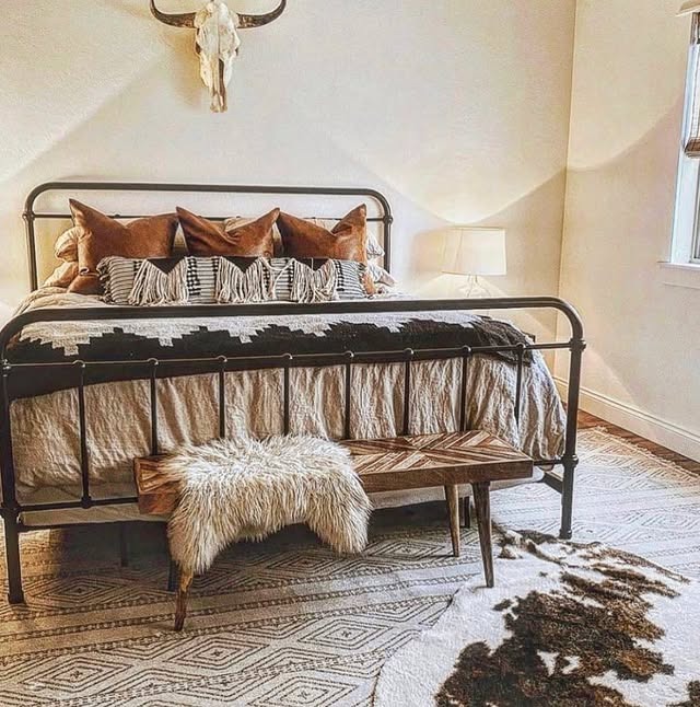 21. Western Bedroom Ideas with Black Metal and Warm Brown Accents - western bedroom ideas