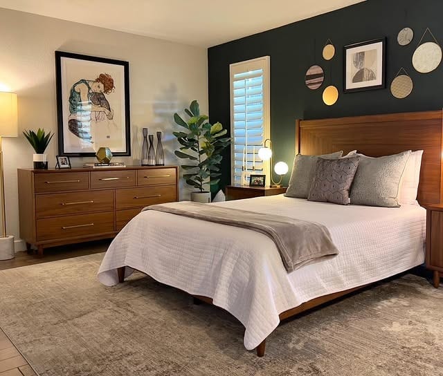 12. Deep Green Accent Wall Bedroom With Walnut Furniture - green bedroom ideas