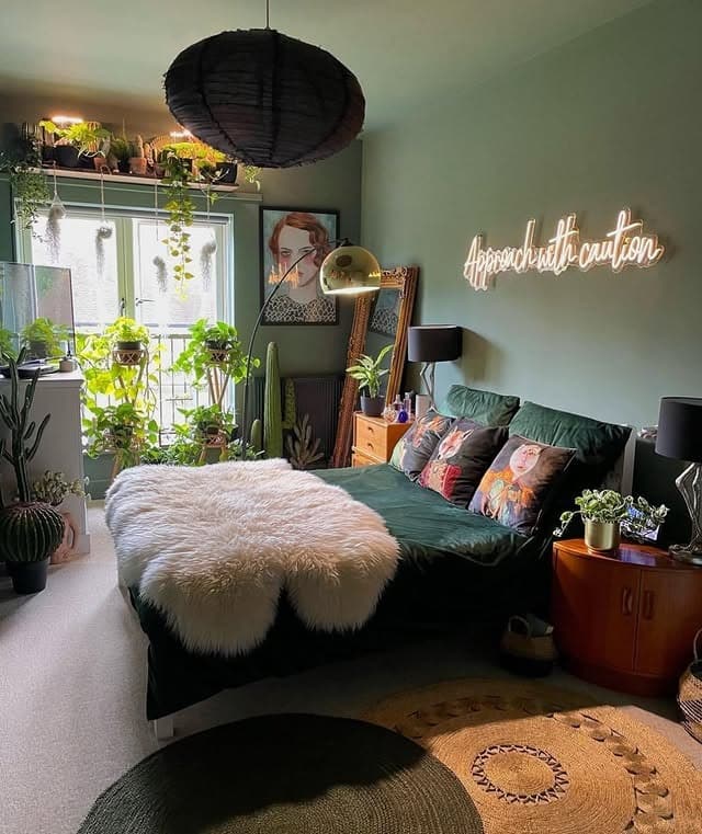 14. Olive Green Bedroom With Indoor Plant Styling - green bedroom ideas