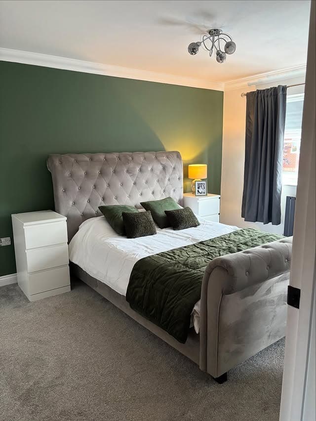17. Simple Green Accent Wall Bedroom With Tufted Bed - green bedroom ideas